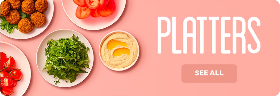Platters: Platter of falafel, hummus, tomatoes and fresh greens at Nabäti Eatery Rotterdam