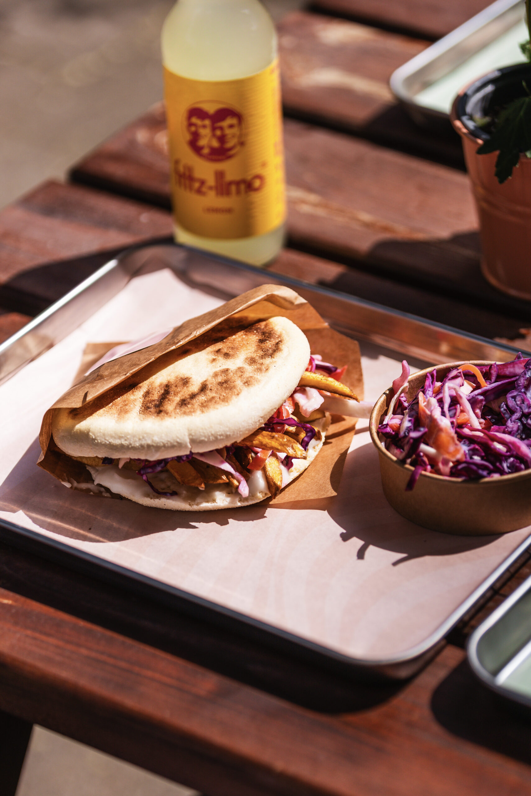 Flatbread sandwich with red cabbage slaw and a fresh lemonade at Nabäti Eatery Rotterdam